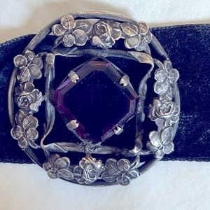 Antique choker with purple stone.